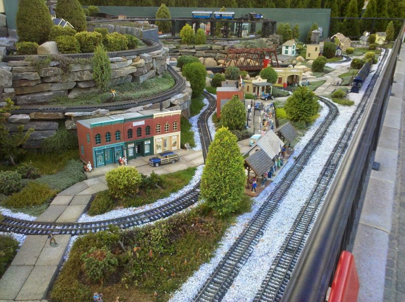 A Hedge Maze With Trains Peeking Through A Hedge Maze With Trains Peeking Through