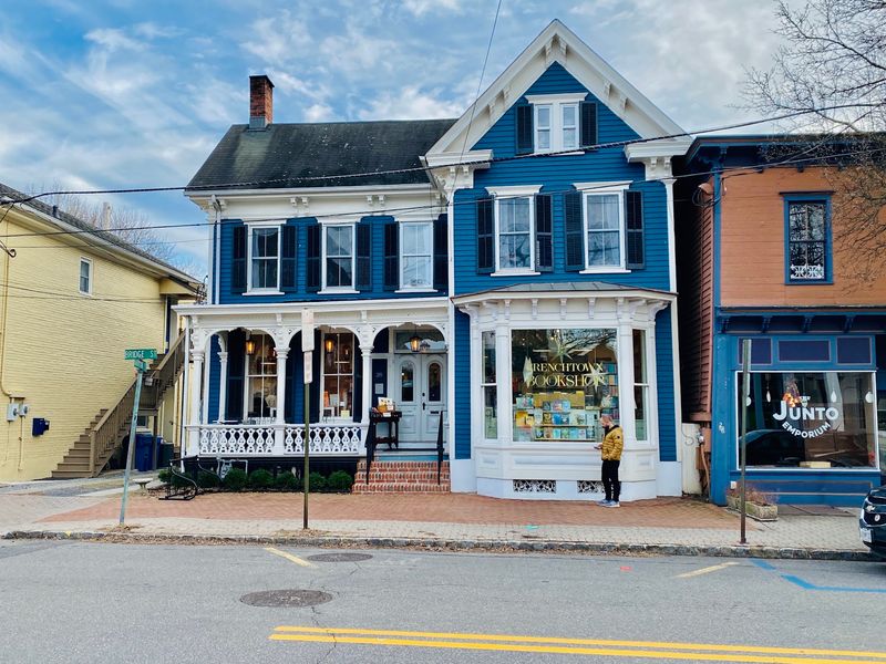 A Storybook Shop In The Middle Of A Small River Town
