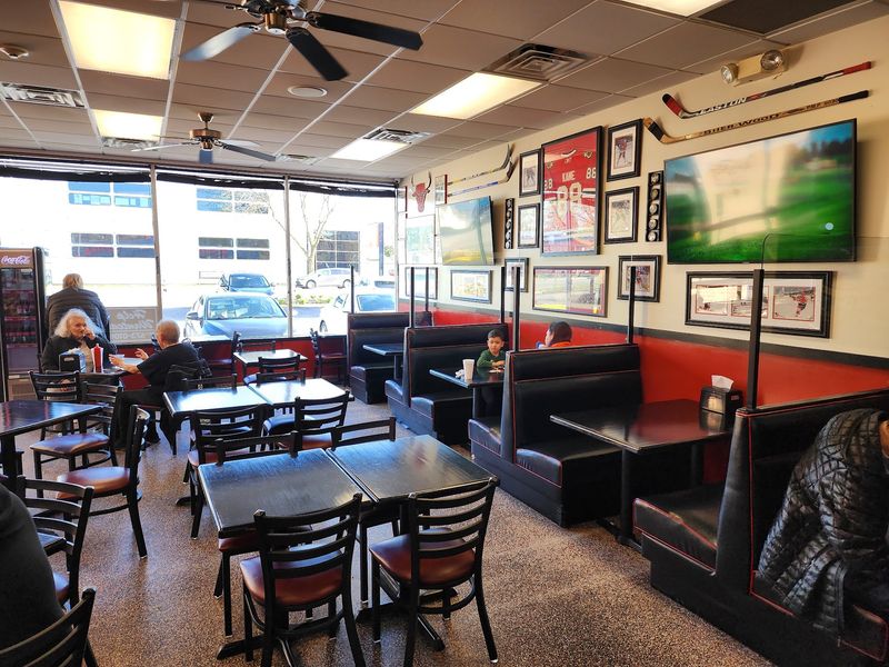 Booths, Barstools, and Familiar Smiles Booths, Barstools, and Familiar Smiles