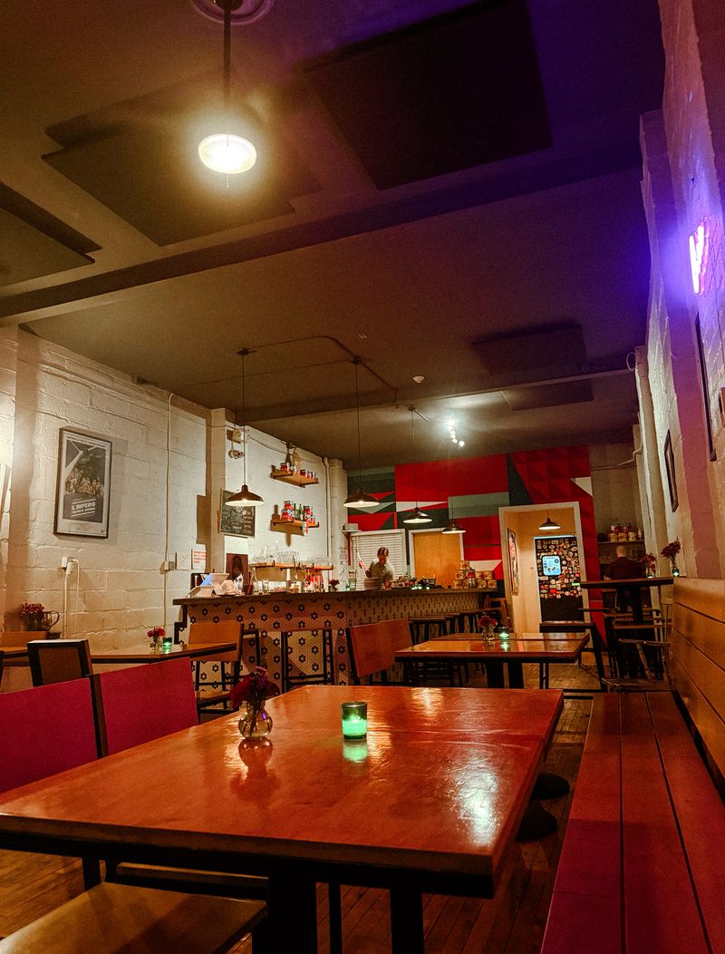 Close Tables, Candlelight, And A Room That Hums Close Tables, Candlelight, And A Room That Hums