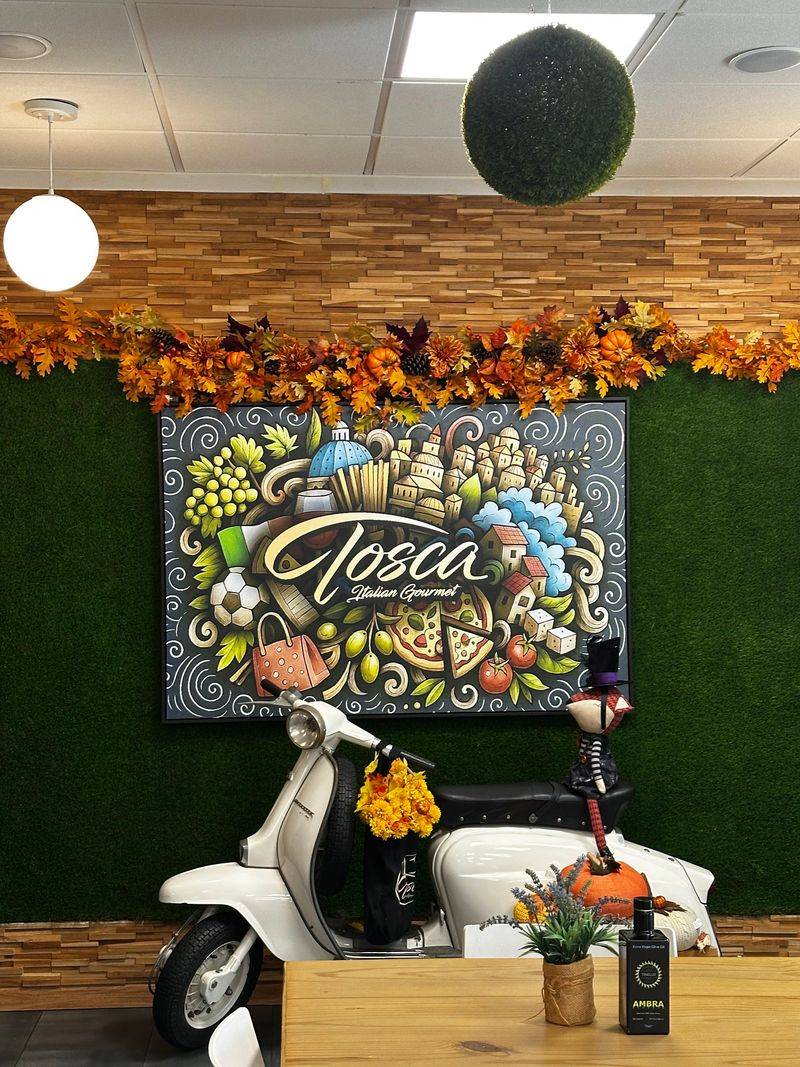 Cozy Corners and a Vespa by the Tables Cozy Corners and a Vespa by the Tables