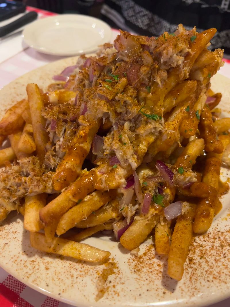 Fries Buried Under Crab and a Shrimp Named for a Legend Fries Buried Under Crab and a Shrimp Named for a Legend
