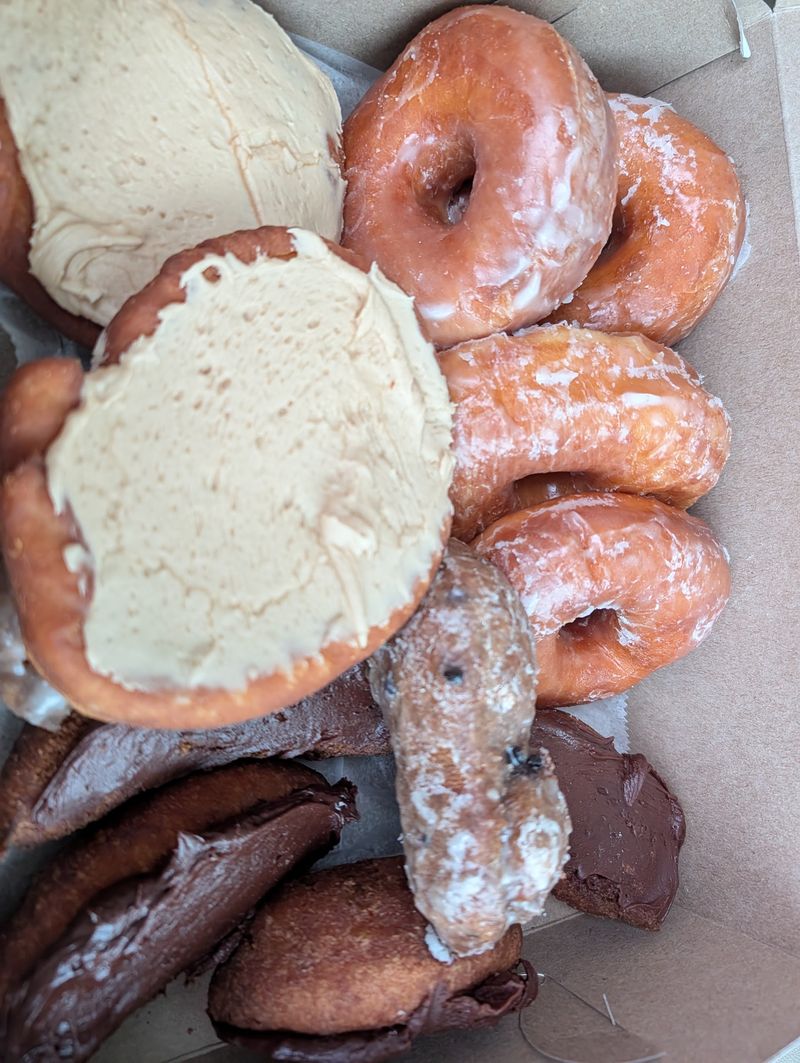 Glazed Raised Donuts Big Enough To Need Two Hands