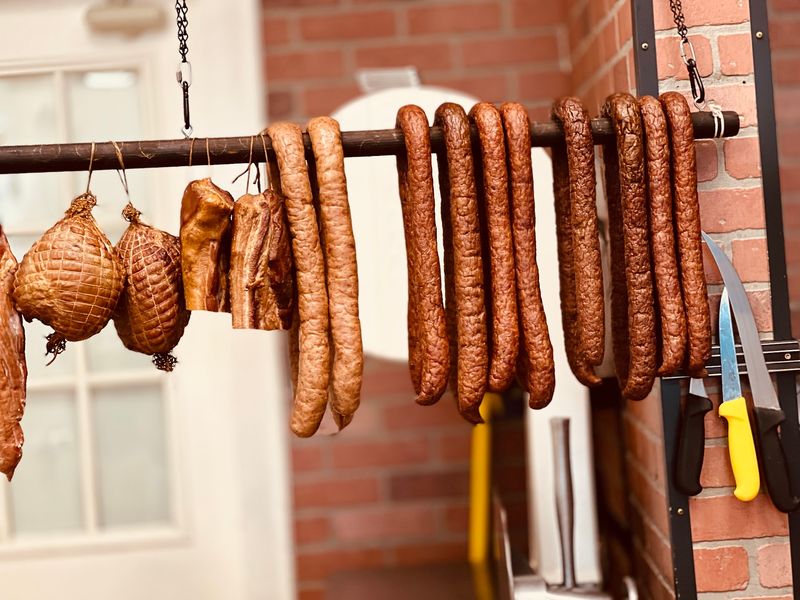 Kielbasa Hanging On Hooks Like A Delicious Welcome Sign Kielbasa Hanging On Hooks Like A Delicious Welcome Sign