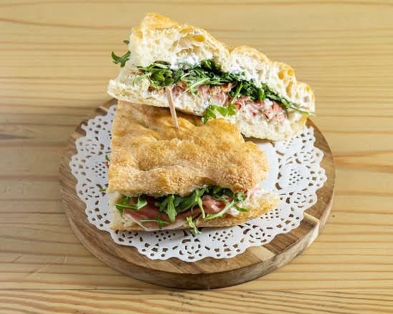 Sandwiches Stacked on House-Baked Bread Sandwiches Stacked on House-Baked Bread