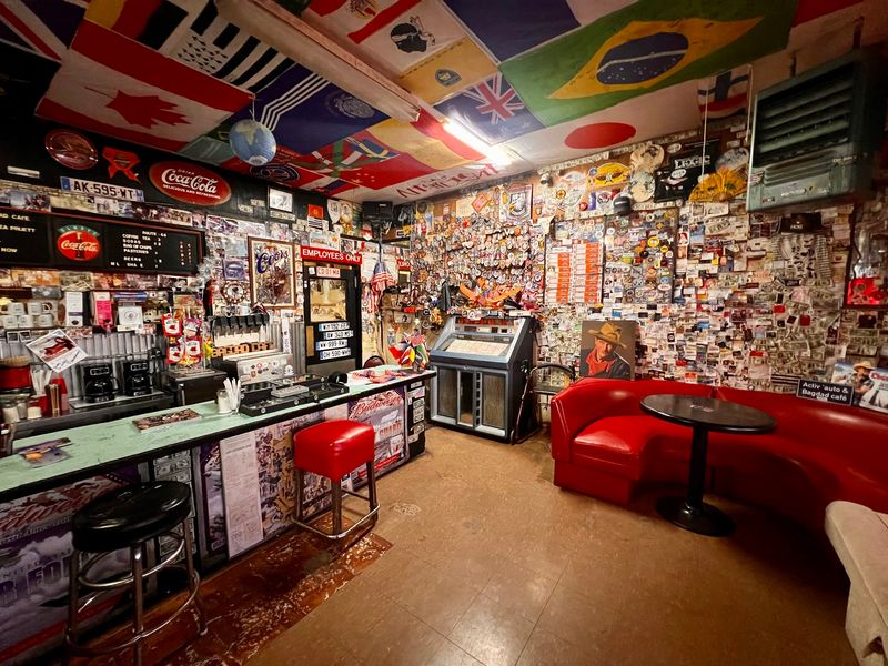 Signed Bills And World Flags Cover Every Spare Inch