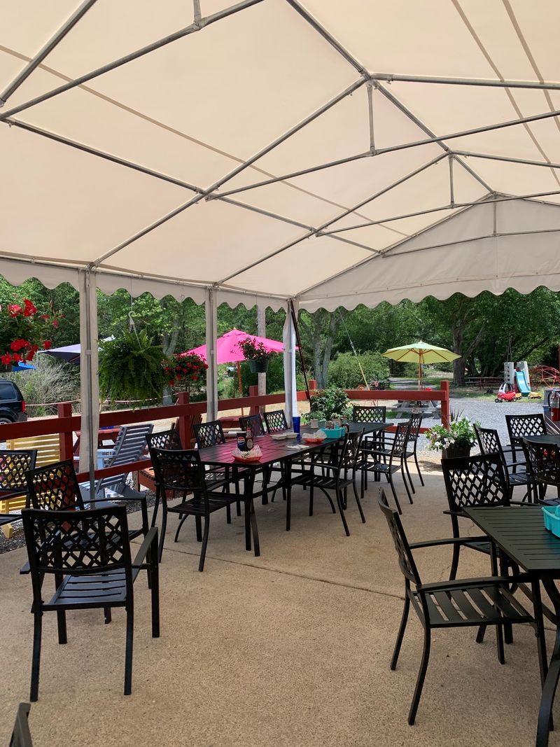 Snug Seats Inside, Picnic Tables Under The Pines