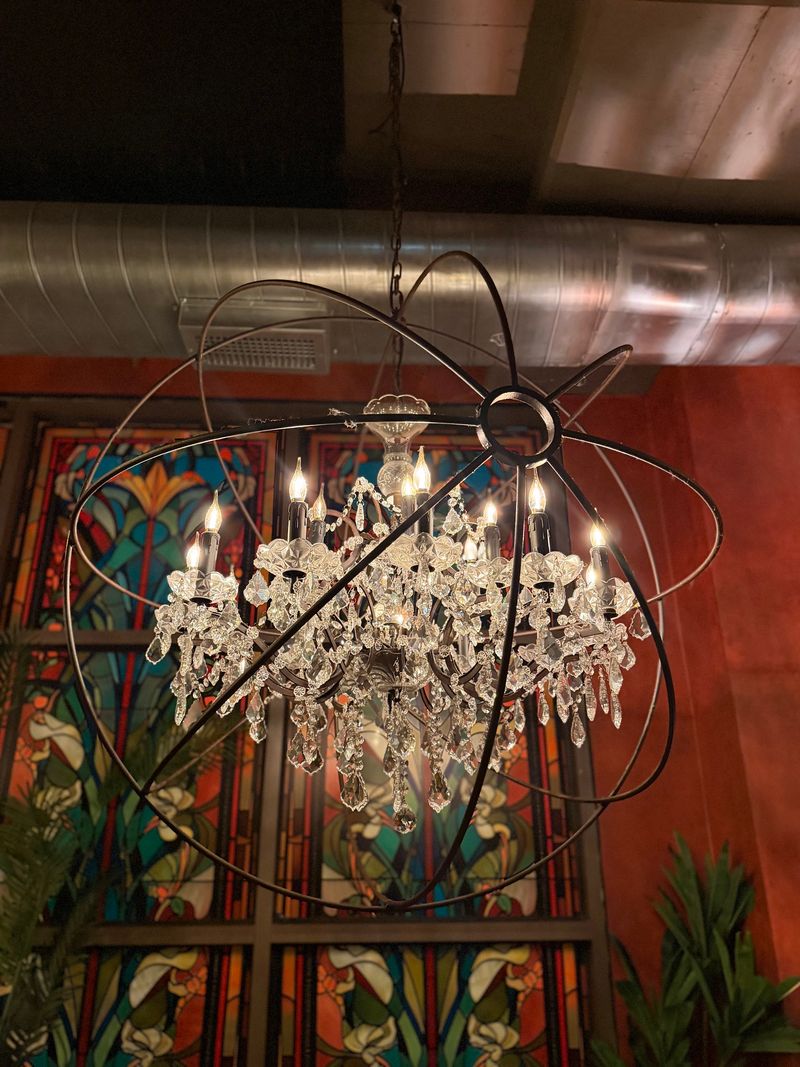 Velvet, Chandeliers, And A Hotel Lobby Mood From Another Era