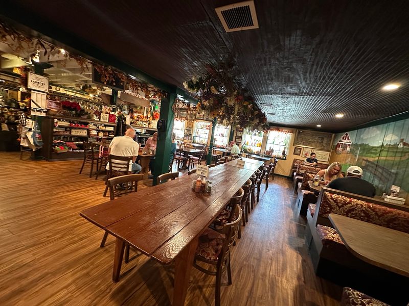 Wooden Beams, Vintage Signs, And A Seat Inside Or Out Wooden Beams, Vintage Signs, And A Seat Inside Or Out